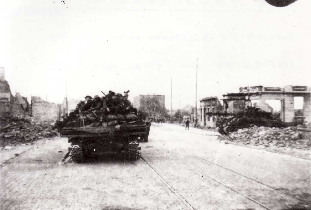 Advancing into Bremen. These are still DD Shermans, but note Firefly on the right of the picture.