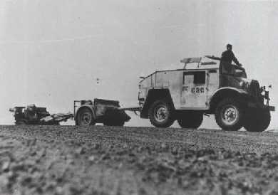 Quad Tractor, Limber and 25pdr gun, of 4th RHA, on the move in 1942.