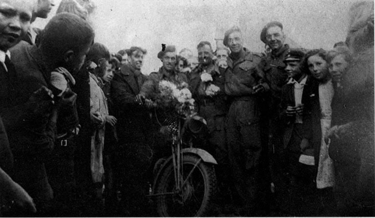 Men of 67 Company RASC and locals in Hebeaux, after its liberation in 1944.